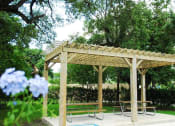 Thumbnail 15 of 18 - Picnic benches near grass at Bay Winds, Miami, FL