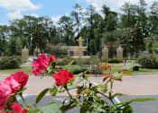 Thumbnail 3 of 14 - Mission Pointe apartments community exterior and fountain at Mission Pointe Apartments, Jacksonville, FL, 32218