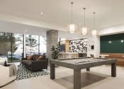 Thumbnail 3 of 33 - Apartments for Rent in Midtown Sacramento, CA - Mod at Midtown - Clubhouse with Billiards Table, Seating Area, Kitchen, and High Ceilings at THE MOD AT MIDTOWN Apartments, SACRAMENTO,  California