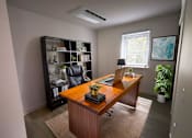 Thumbnail 33 of 33 - A room with a desk, chair, and bookshelf.