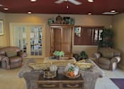 Thumbnail 13 of 21 - Clubhouse seating at Carolina Club Apartments, Daytona Beach, Florida