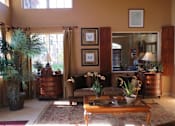 Thumbnail 9 of 21 - Leasing office seating at Carolina Club Apartments, Daytona Beach, FL