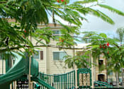 Thumbnail 7 of 15 - Playground near building at Hawk's Landing Apartments, Florida, 33907