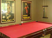 Thumbnail 9 of 15 - Pool table in center of room at Hawk's Landing Apartments, Fort Myers