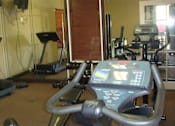 Thumbnail 12 of 14 - Gym with cardio equipment at Hunters Run, Middleburg, FL
