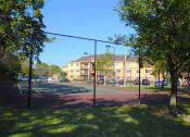 Thumbnail 7 of 19 - exterior and tennis court at Indian Trace, West Palm Beach, FL 33407