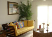 Thumbnail 12 of 19 - living area with view of balcony at Indian Trace, West Palm Beach, FL 33407