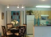 Thumbnail 8 of 13 - kitchen with white appliances and blonde colored cabinetryat Mariners Cove, Tampa, FL 80021