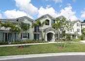 Thumbnail 3 of 14 - community exterior with sidewalks at Mirabella Apartments, Florida