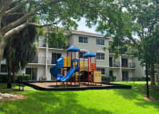 Thumbnail 25 of 27 - Outdoor playground at Tuscany Place Apartments, Homestead , 33032