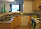 Thumbnail 18 of 27 - home kitchen with white appliances at Tuscany Place Apartments, Florida