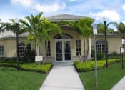 Thumbnail 6 of 9 - main entrance to leasing office at Valencia Pointe, Miami, Florida