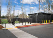Thumbnail 7 of 52 - sidewalk near enclosed bicycle parking lot at Fort Vancouver Terrace, Vancouver, 98661