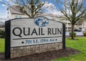 Thumbnail 1 of 50 - a sign for the a sign for the quail run apartments Apartments, Vancouver, WA