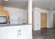 Thumbnail 38 of 50 - an empty kitchen with white cabinets and a counter top at Quail Run Apartments, Vancouver, WA 98684