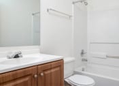 Thumbnail 50 of 50 - a bathroom with a sink toilet and a bath tub at Quail Run Apartments, Vancouver, WA
