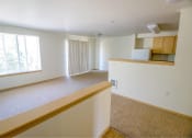 Thumbnail 28 of 46 - an empty living room at Troutdale Terrace, Troutdale, OR 97060