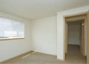 Thumbnail 29 of 46 - an empty room with a window and a door at Troutdale Terrace, Troutdale, OR