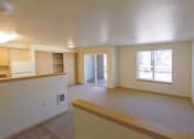 Thumbnail 35 of 46 - an empty living room and kitchen with a window at Troutdale Terrace, Troutdale,  97060