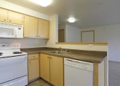 Thumbnail 40 of 46 - a kitchen with cabinet at Troutdale Terrace, Oregon 97060
