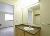 Thumbnail 43 of 46 - a bathroom with a sink toilet at Troutdale Terrace, Troutdale, OR 97060