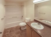 Thumbnail 45 of 46 - a bathroom with a sink and a toilet and a bath tub at Troutdale Terrace, Oregon