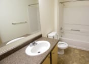 Thumbnail 46 of 46 - a bathroom with a sink toilet and a bath tub at Troutdale Terrace, Troutdale, OR