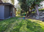 Thumbnail 18 of 49 - green lawn outside apartments at Whisperwood, Seattle, Washington