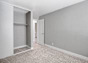 Thumbnail 35 of 63 - A room with a white door and a white wall at The Henley Apartments, Suisun City, CA