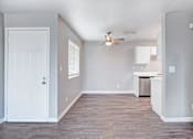 Thumbnail 29 of 63 - A room with a white door and a ceiling fan at The Henley Apartments, California