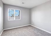 Thumbnail 32 of 63 - A room with a window overlooking a construction site at The Henley Apartments, Suisun City