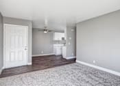 Thumbnail 46 of 63 - A room with a white door and a white cabinet with a fan above it at The Henley Apartments, California, 94585