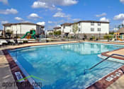 Thumbnail 1 of 11 - A swimming pool at Valencia Trace, ORLANDO, FL