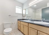 Thumbnail 28 of 29 - Bathroom with mirror at Bridge Meadows Redmond Apartments, Redmond