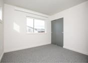 Thumbnail 23 of 29 - Room with grey door at Bridge Meadows Redmond Apartments, Redmond, Oregon