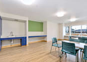 Thumbnail 10 of 29 - Modern community space at Bridge Meadows Redmond Apartments, Oregon, 97756