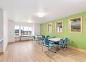 Thumbnail 12 of 29 - Community common room at Bridge Meadows Redmond Apartments, Oregon