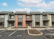 Thumbnail 2 of 29 - Parking lot at Bridge Meadows Redmond Apartments, Redmond, OR