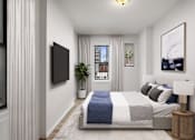Thumbnail 5 of 18 - A bedroom with a large bed and a flat screen TV mounted on the wall.