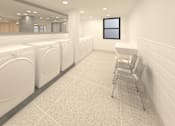 Thumbnail 9 of 9 - A laundromat with washers and dryers lined up.