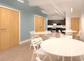 Thumbnail 8 of 9 - A white table surrounded by white chairs in a room with blue walls.