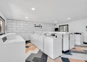 Thumbnail 9 of 12 - Laundry Room at Zoom Apartments, Las Vegas, 89103