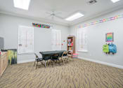 Thumbnail 4 of 20 - Kids Activity Room at PALMETTO RIDGE Apartments, TITUSVILLE, FL, 32960