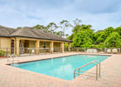 Thumbnail 11 of 20 - Blue Cool Swimming Pool at PALMETTO RIDGE Apartments, TITUSVILLE, Florida
