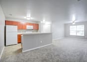 Thumbnail 12 of 20 - Kitchen with White Appliances at PALMETTO RIDGE Apartments, TITUSVILLE