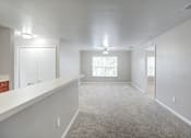 Thumbnail 13 of 20 - Empty Living Area at PALMETTO RIDGE Apartments, TITUSVILLE, 32960