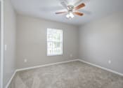 Thumbnail 19 of 20 - Room with a Ceiling Fan at PALMETTO RIDGE Apartments, Florida, 32960