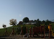 Thumbnail 13 of 28 - A playground with a yellow caution tape around it.