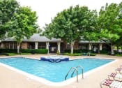 Thumbnail 3 of 11 - Pool with seating area at ARBORS OF KILLEEN, KILLEEN, Texas
