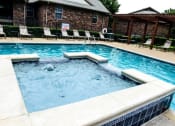 Thumbnail 2 of 11 - Pool and spa with seating at ARBORS OF KILLEEN, KILLEEN, 76542
